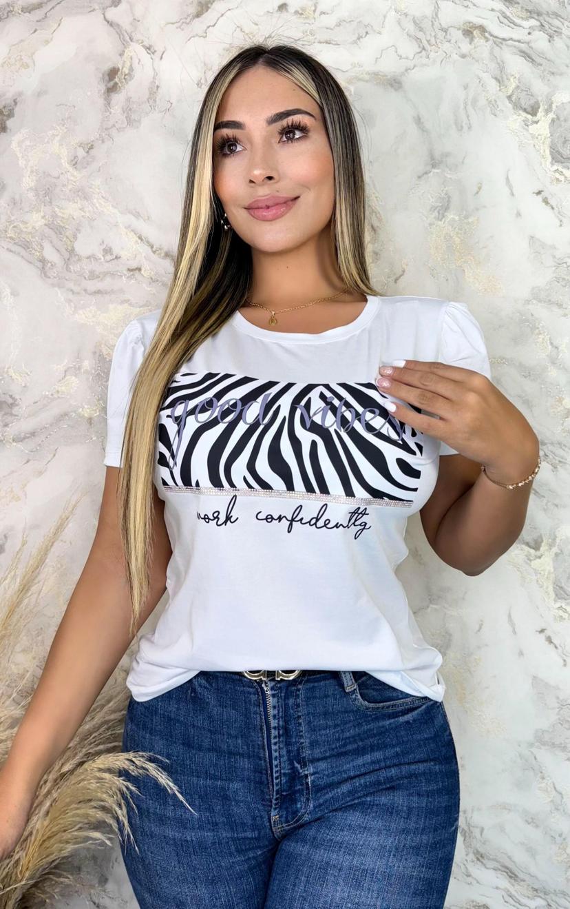 Blusa dama blanca con animal print